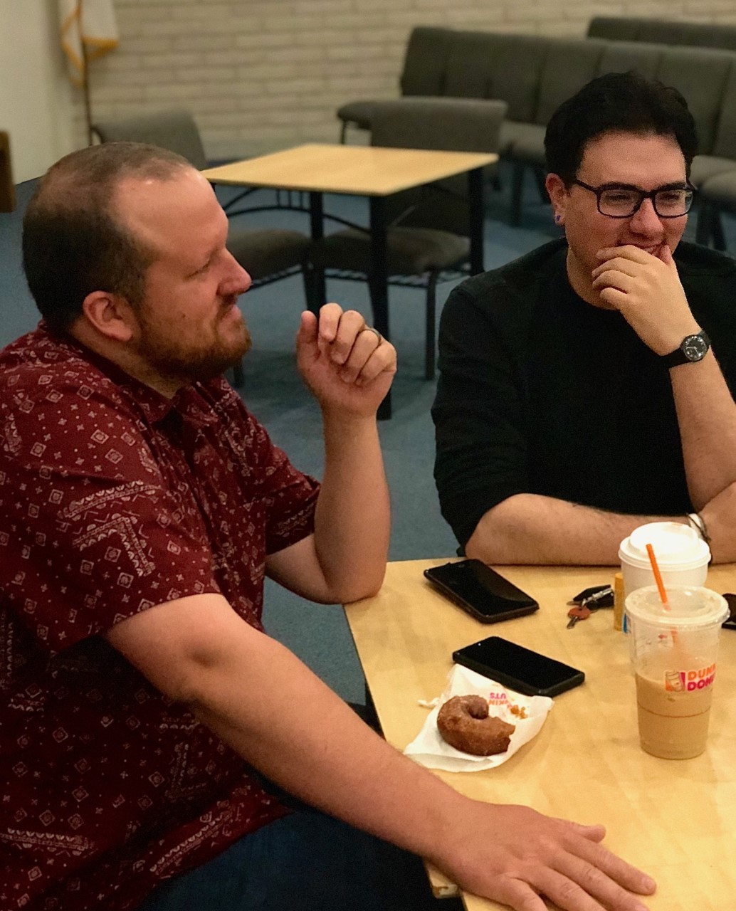 Two Men Having Snacks